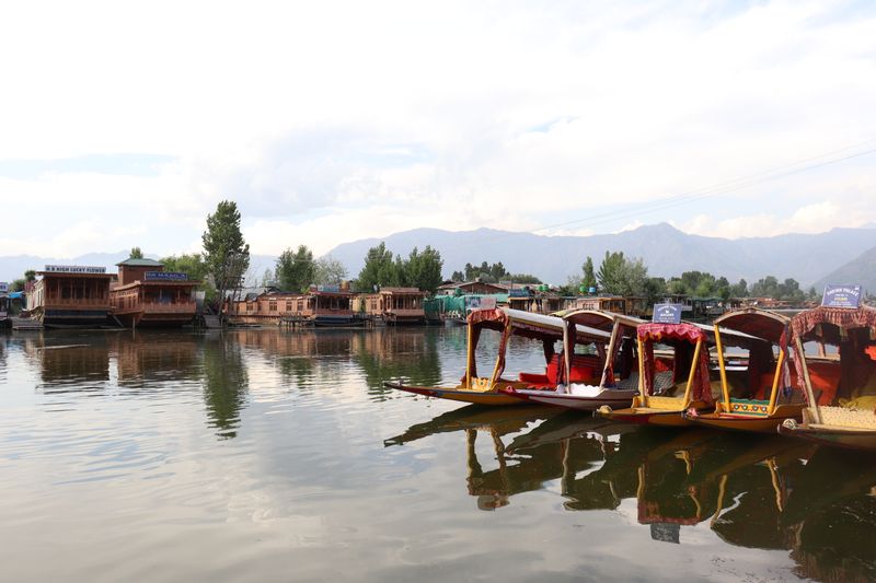 Dal Lake Kashmir with shikara boats and houseboats